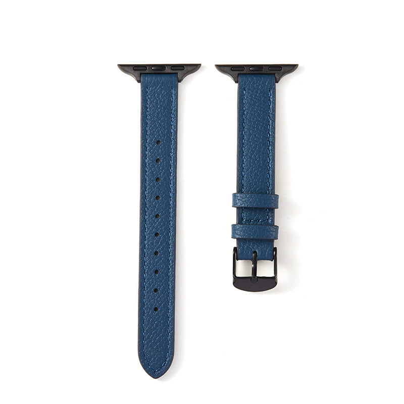 Correa fina de cuero granulado azul para Apple Watch de la marca Vivaldo, muestra la textura y el diseño elegante de la correa.