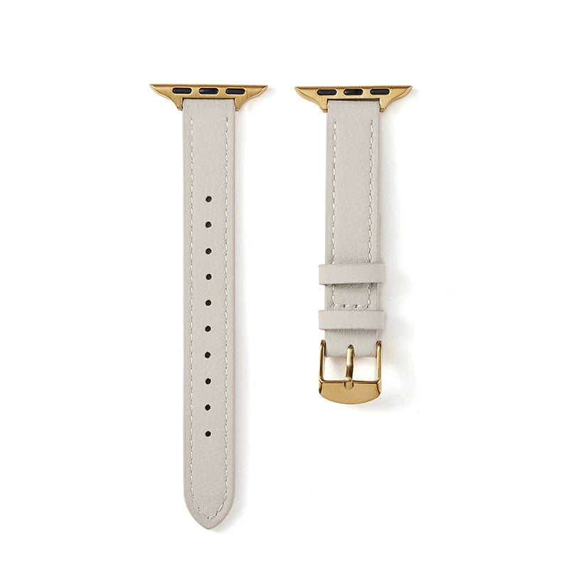 Correa fina de cuero granulado para Apple Watch en color blanco crema, de la marca Vivaldo, con diseño elegante y suave al tacto.