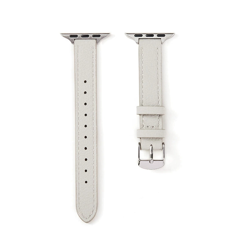 Correa fina de cuero granulado para Apple Watch en color gris perla, de la marca Vivaldo, muestra detalles elegantes y textura suave.
