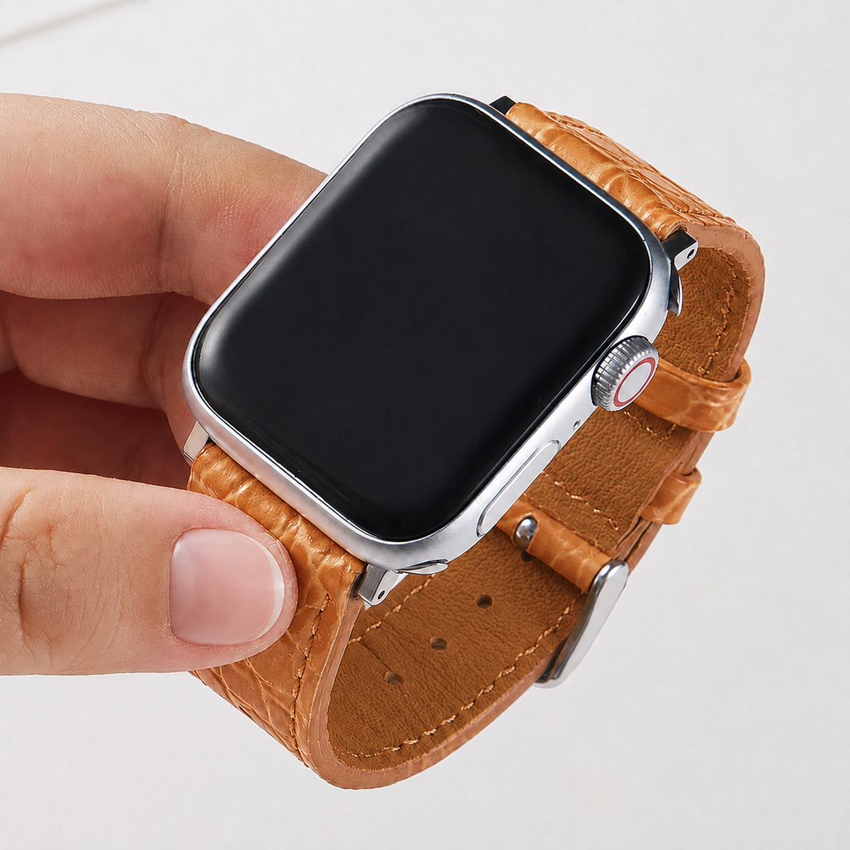 Correa de cuero con grabado de cocodrilo para Apple Watch, marca Vivaldo, en color camel, muestra la textura y diseño elegante.
